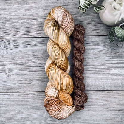 Autumn yellows, greens and brown full skein with a bark brown mini skein.