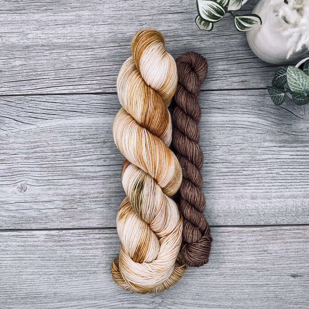 Autumn yellows, greens and brown full skein with a bark brown mini skein.