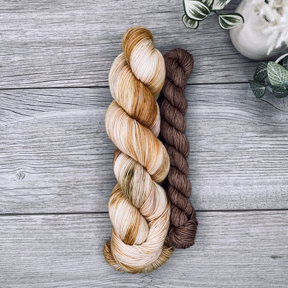 Autumn yellows, greens and brown full skein with a bark brown mini skein.