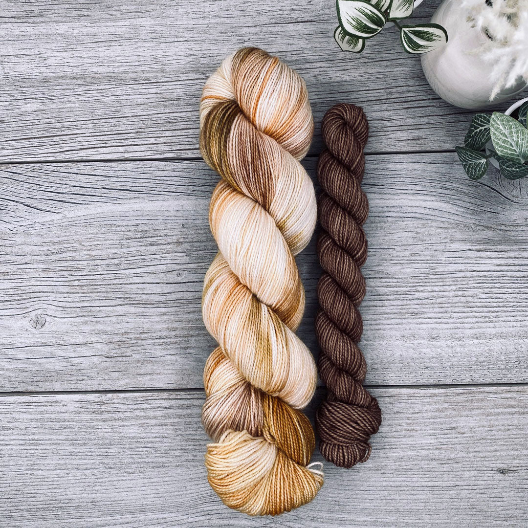 Autumn yellows, greens and brown full skein with a bark brown mini skein.