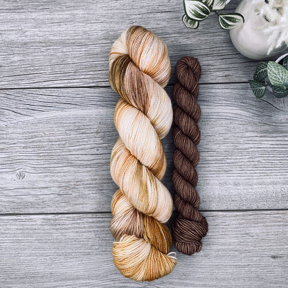 Autumn yellows, greens and brown full skein with a bark brown mini skein.